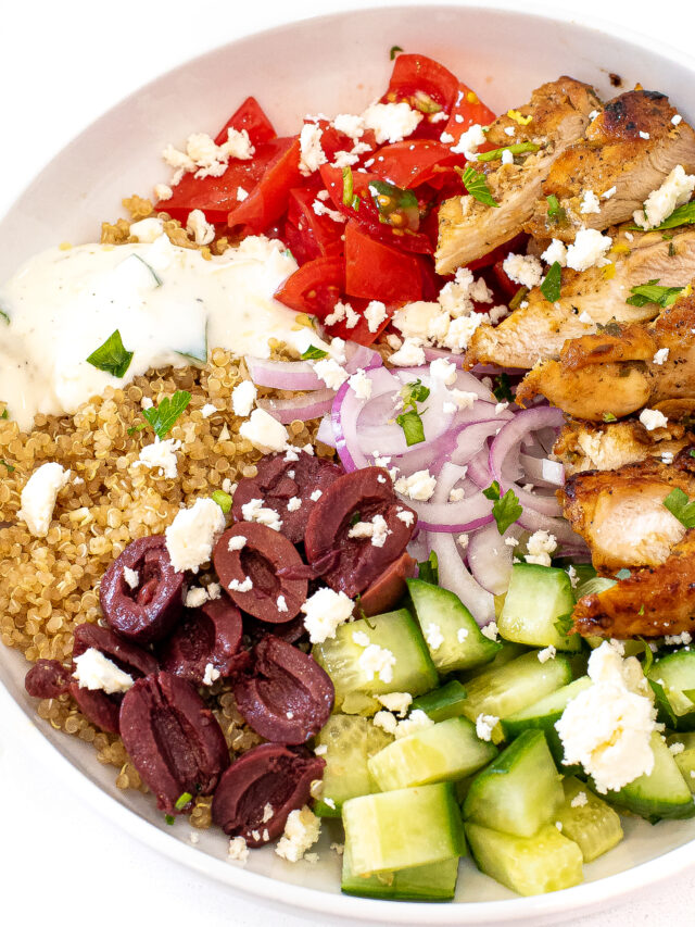 Greek chicken bowl in a white bowl. 