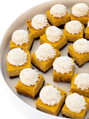 mini-pumpkin-cheesecakes-topped-with-maple-whipped-cream
