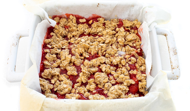 Strawberry oatmeal bars in a baking dish after being baked.