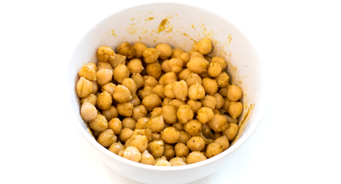 curry-spiced chickpeas in a small white bowl