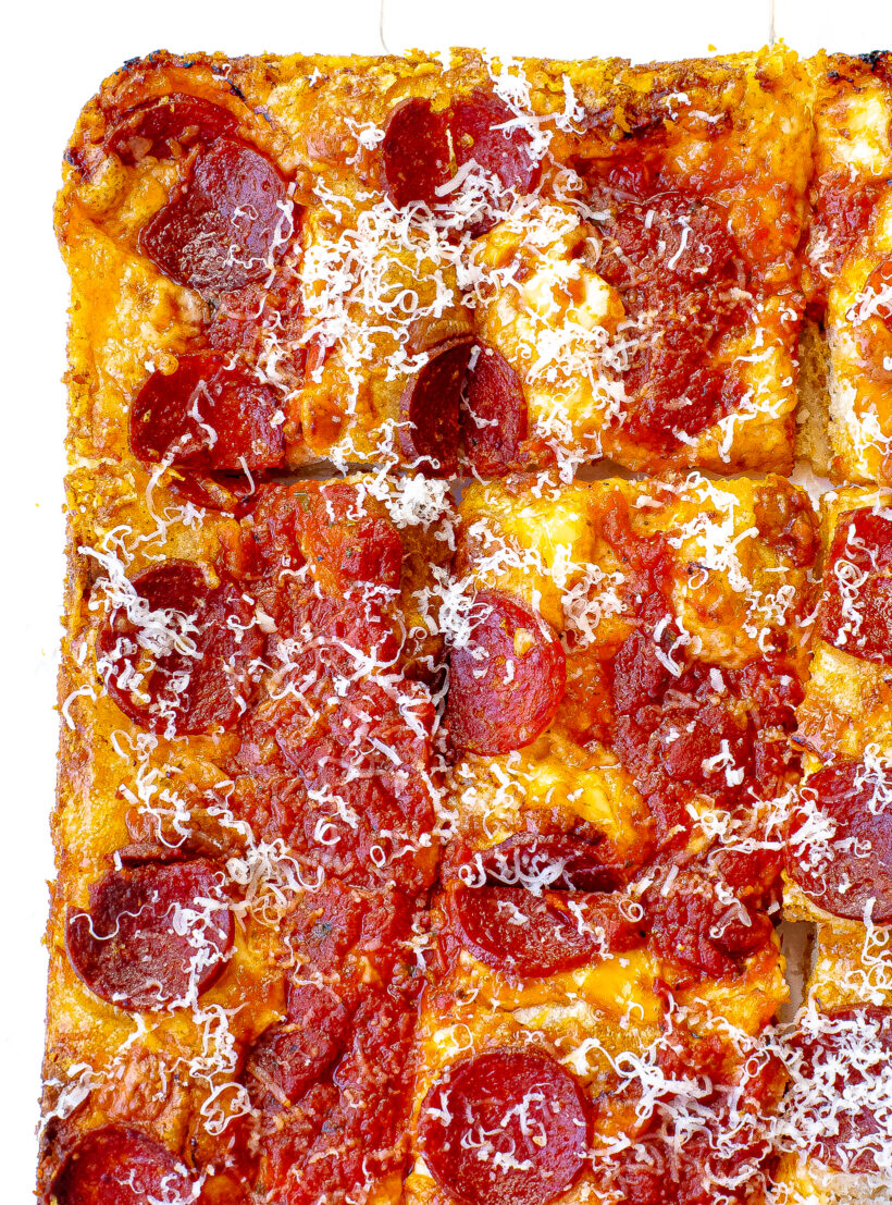 Baked Detroit Style Pizza cut into slices.