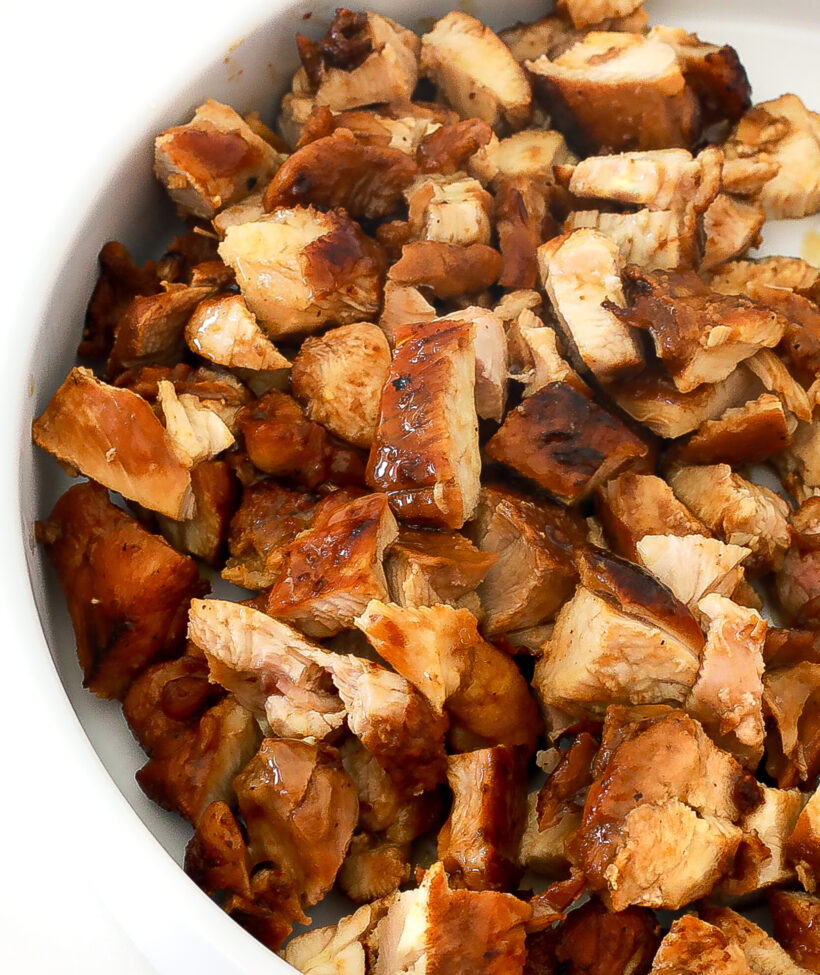 Diced honey chipotle chicken in a bowl. 