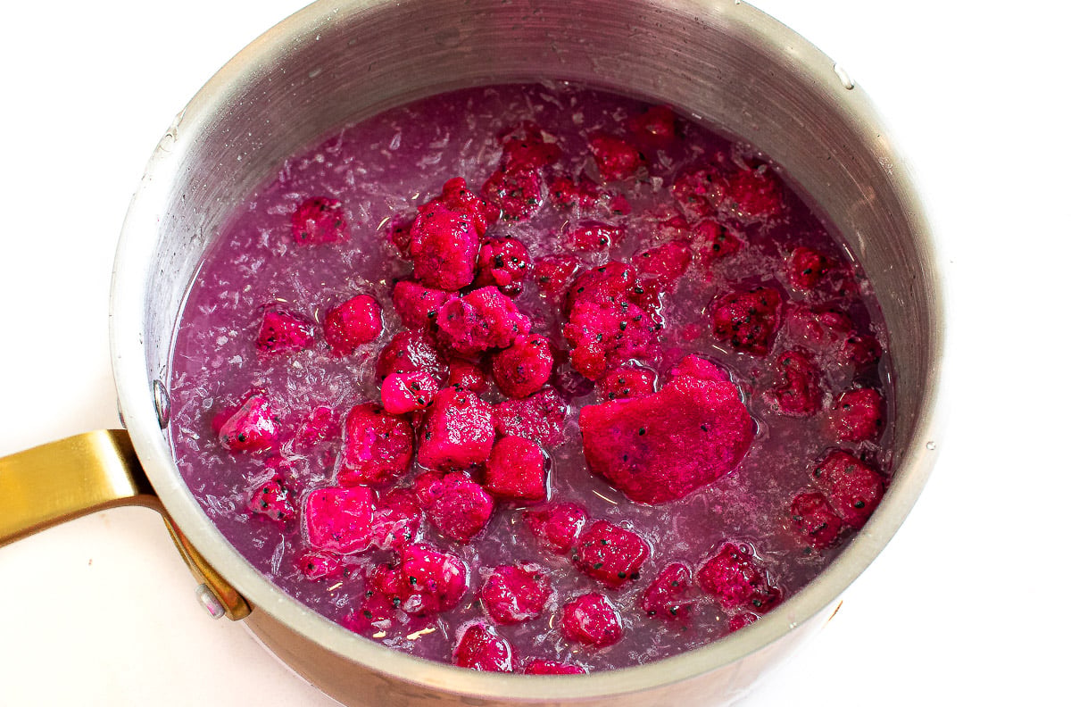 Dragon fruit, water, sugar and cornstarch in a saucepan.
