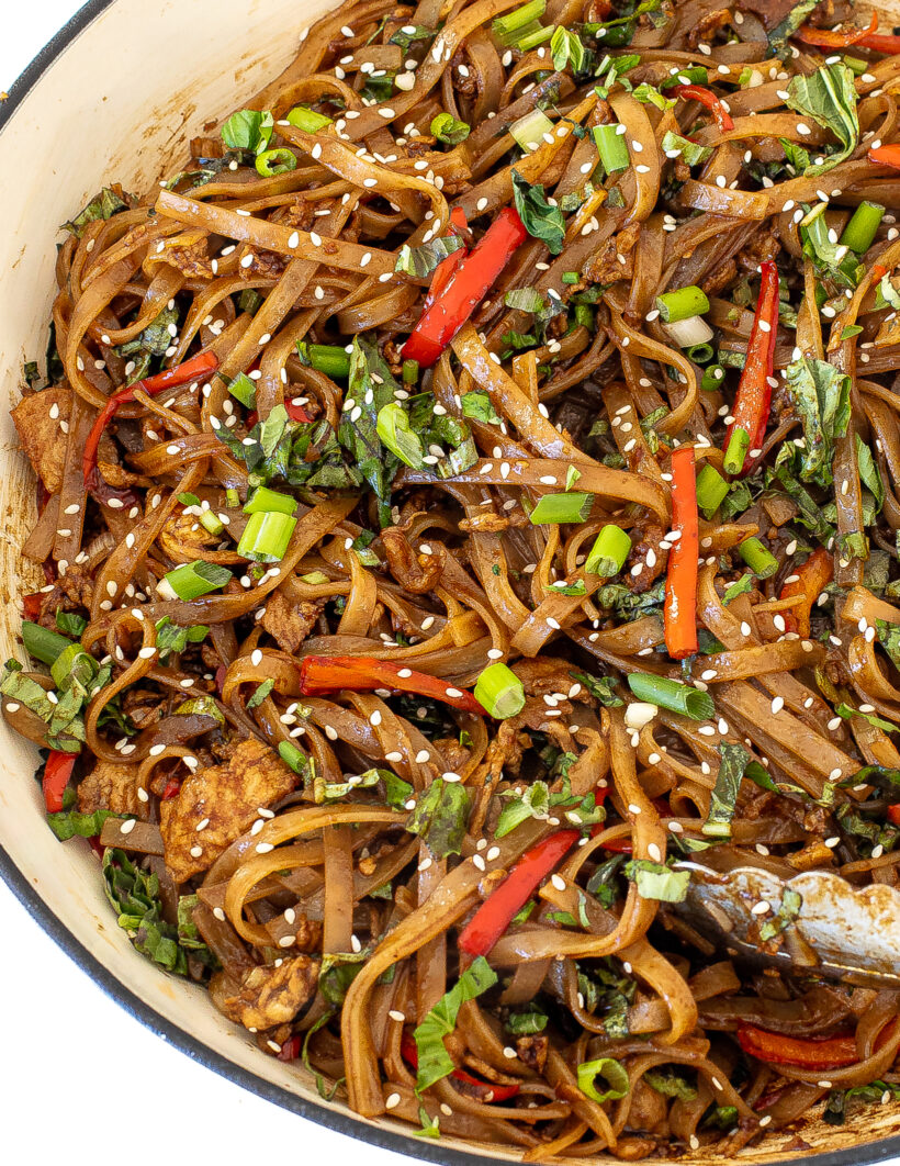 Drunken noodles in a skillet. 