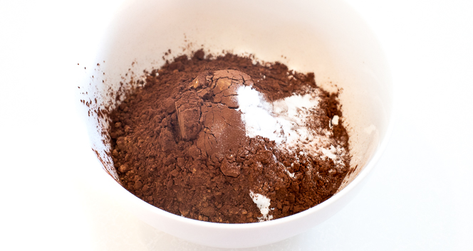Dry ingredients in a white mixing bowl.