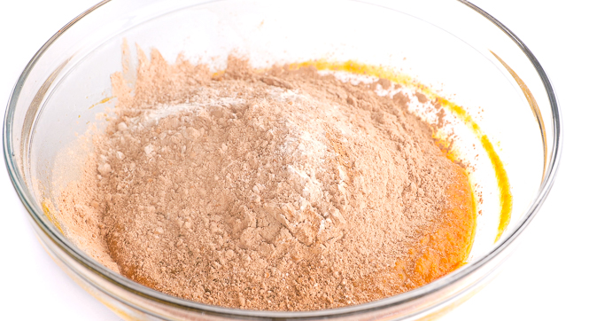 combining dry ingredients in large clear bowl