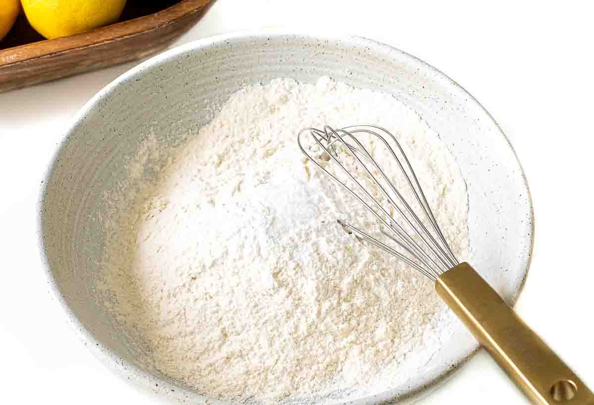 whisking dry ingredients in a small bowl