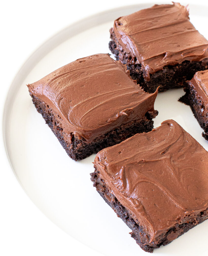 brownies with chocolate frosting on top