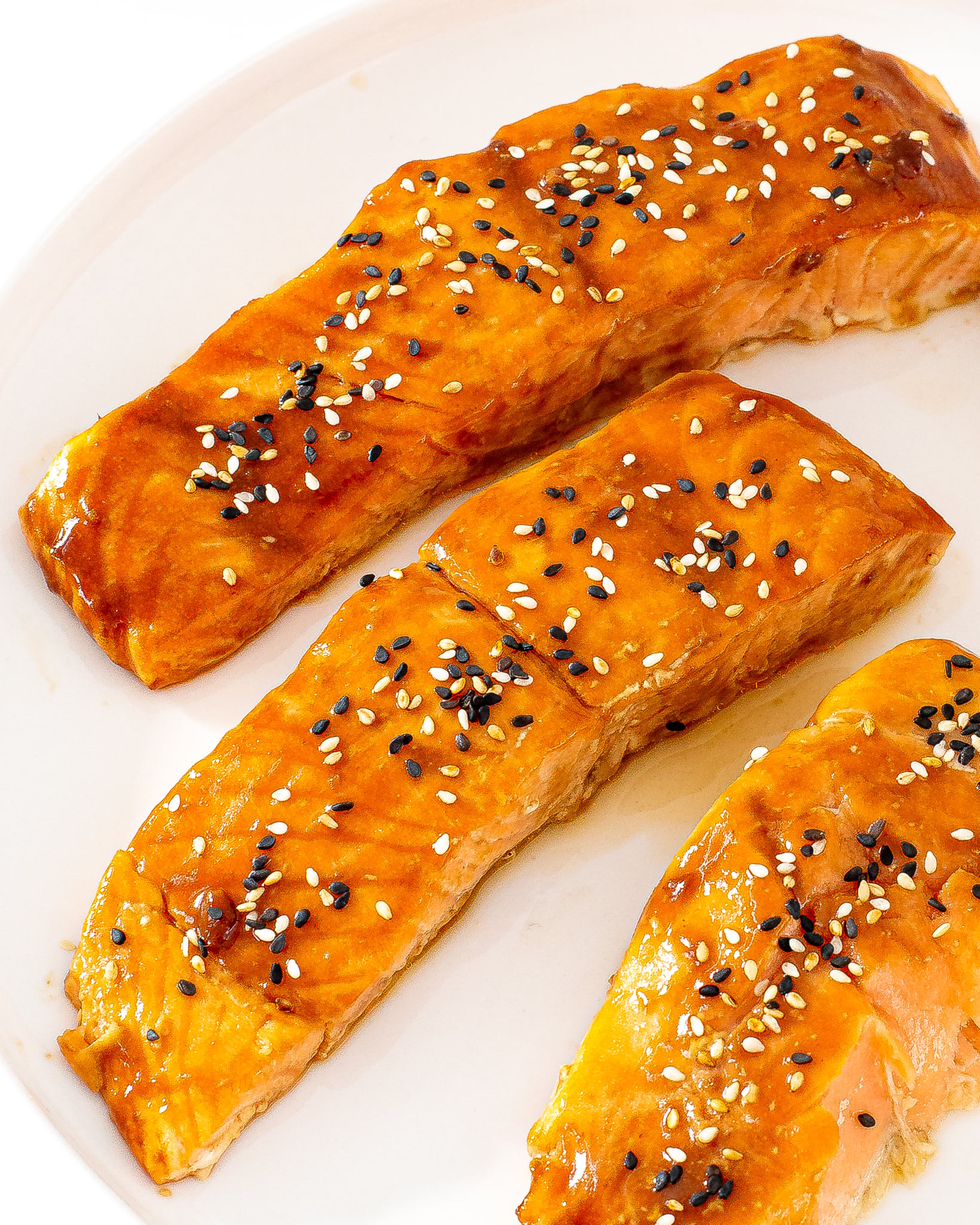 Honey sriracha glazed salmon on a plate