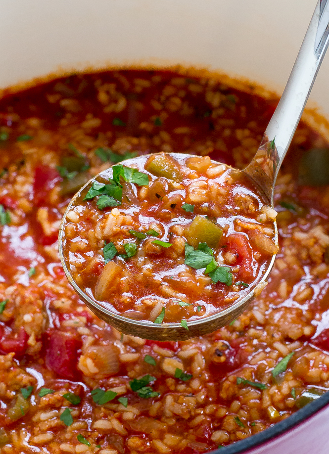 Sausage Rice and Pepper Soup topped with fresh chopped parsley