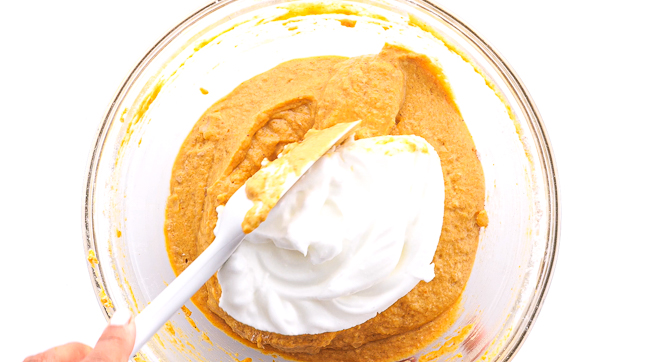 folding whipped egg whites into batter