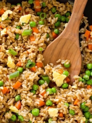 fried rice in pan with spoon
