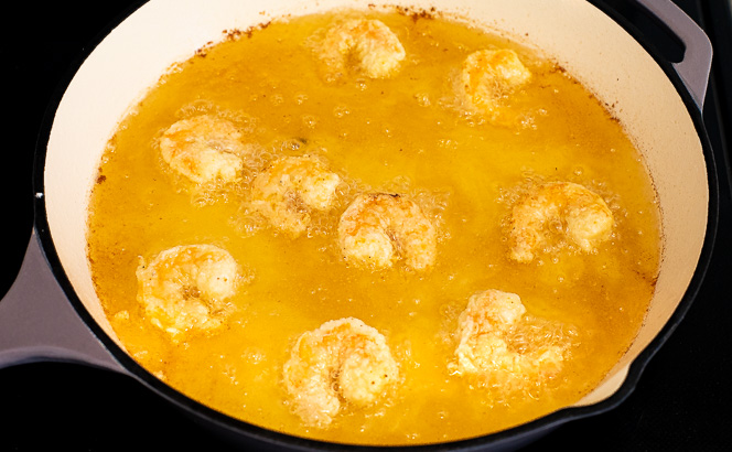 Shrimp frying in a frying pan. 