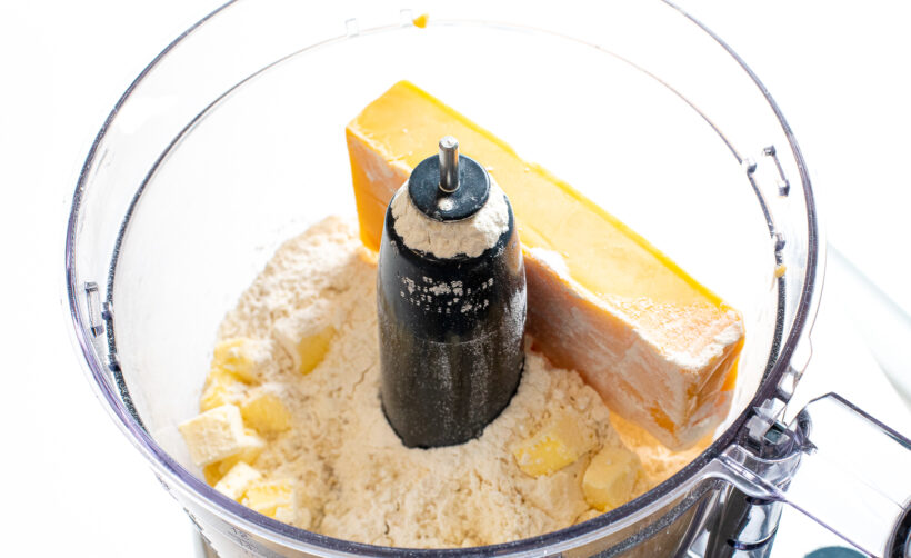 Ingredients for goldfish crackers in a food processor. 