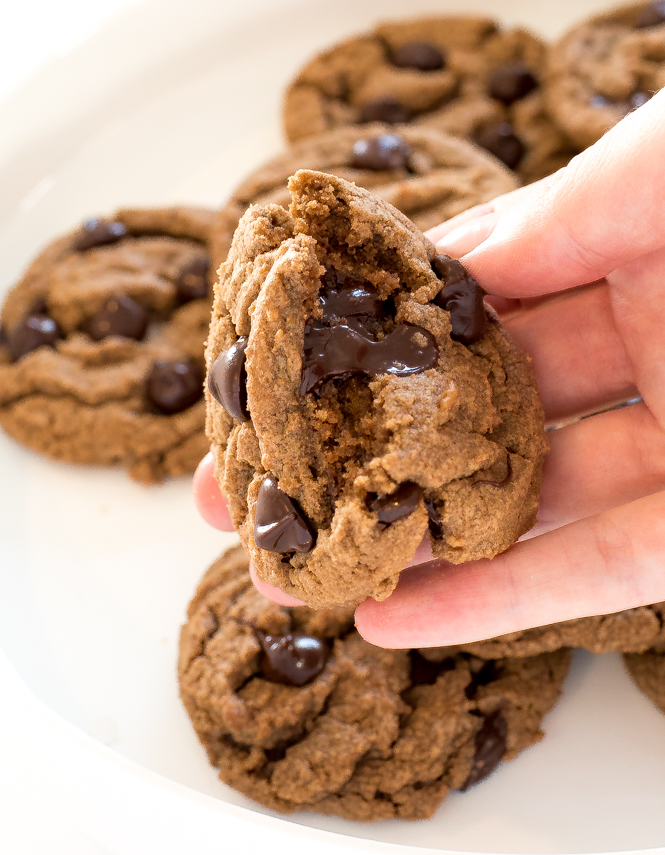 Nutella Chocolate Chip Cookies with authors hand holding one