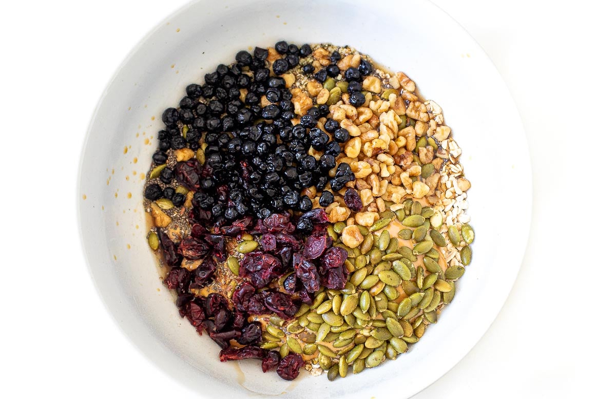 dried fruits, nuts and seeds in large bowl for granola cookies