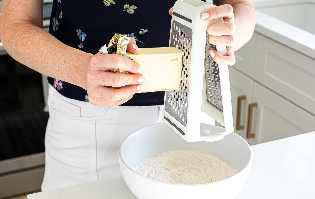 grating cheddar cheese with box grater