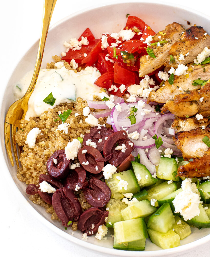 Greek chicken bowl with quinoa and veggies.