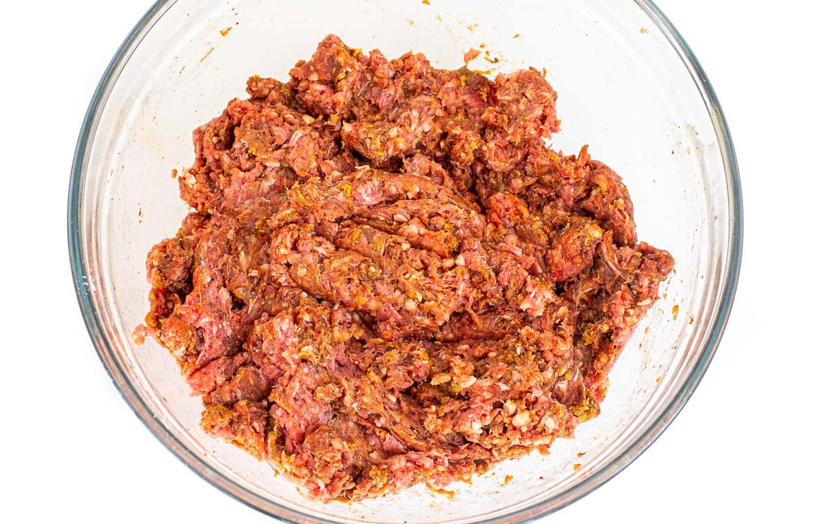 marinated ground beef in seasonings and sauces for stir fry