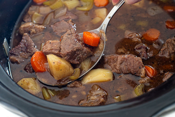 spooning crockpot beef Guinness stew
