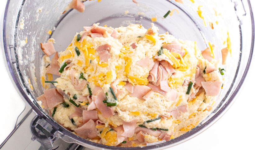 Ham and cheese scone dough in a food processor. 