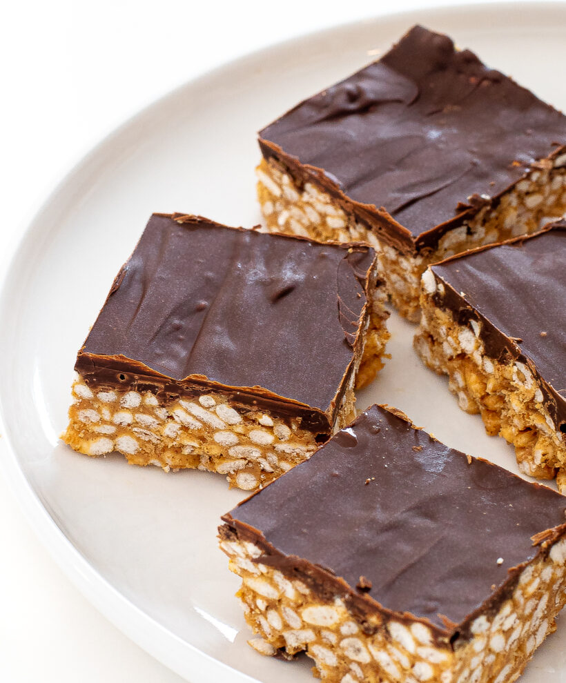 Scotcheroo squares on a plate. 