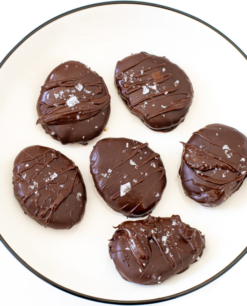 Top down view of Healthy Reese's Eggs on a white plate.
