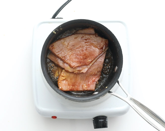 heating ham in saucepan