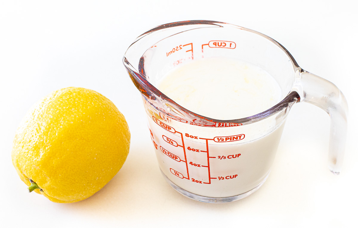 lemon and milk on counter to make homemade buttermilk