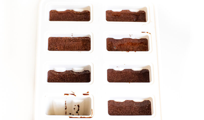 Fudgesicles poured into a silicone mold.