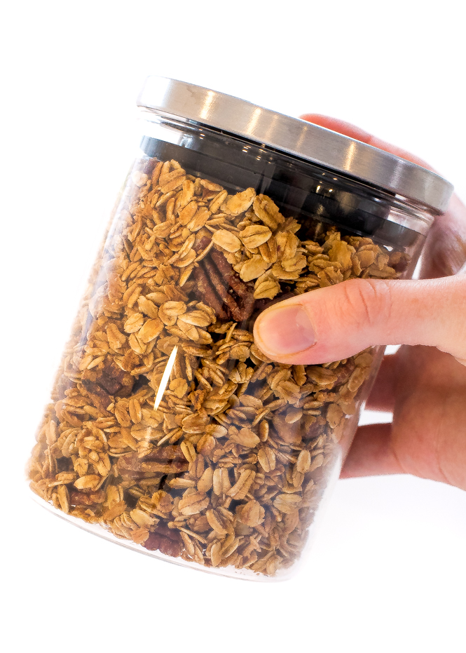 Maple Pecan Granola in a clear storage jar Maple Pecan Granola in a clear storage jar