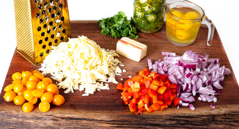 Ingredients laid out for breakfast burritos.