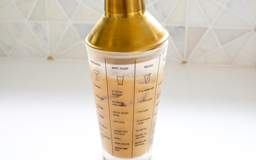 Pumpkin spice eggnog martini in a shaker.