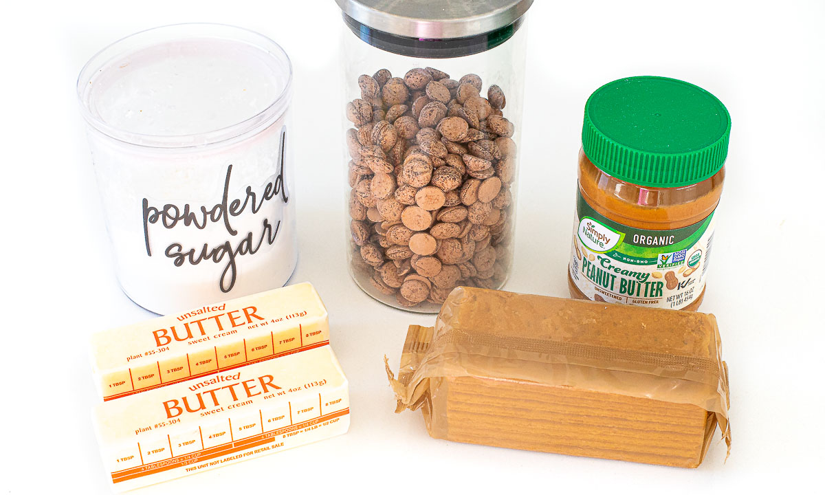 ingredients for chocolate peanut butter bars on white counter top