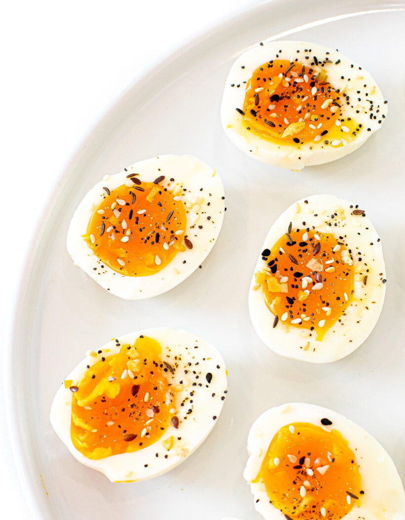 Jammy eggs served with a sprinkle of everything bagel seasoning on top.