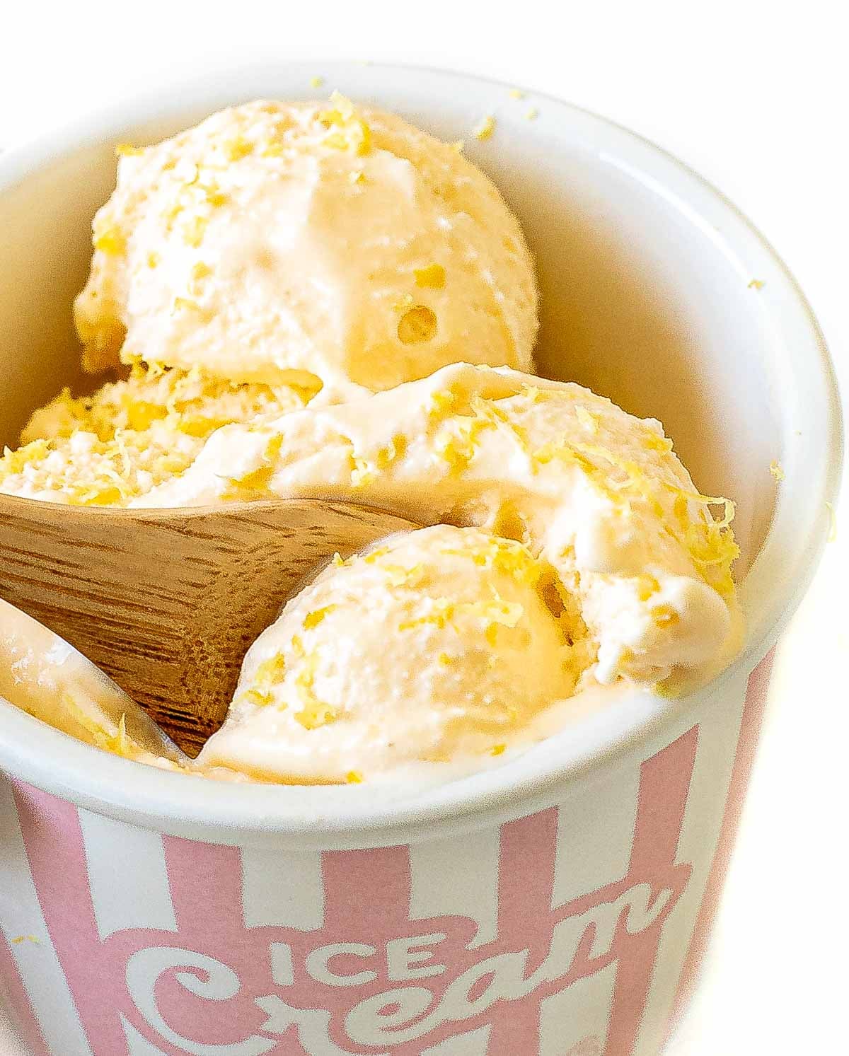 homemade lemon ice cream with lemon zest on top