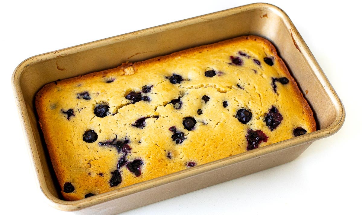 baked lemon blueberry bread in loaf pan