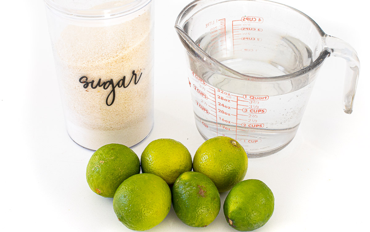 ingredients for limeade on white counter