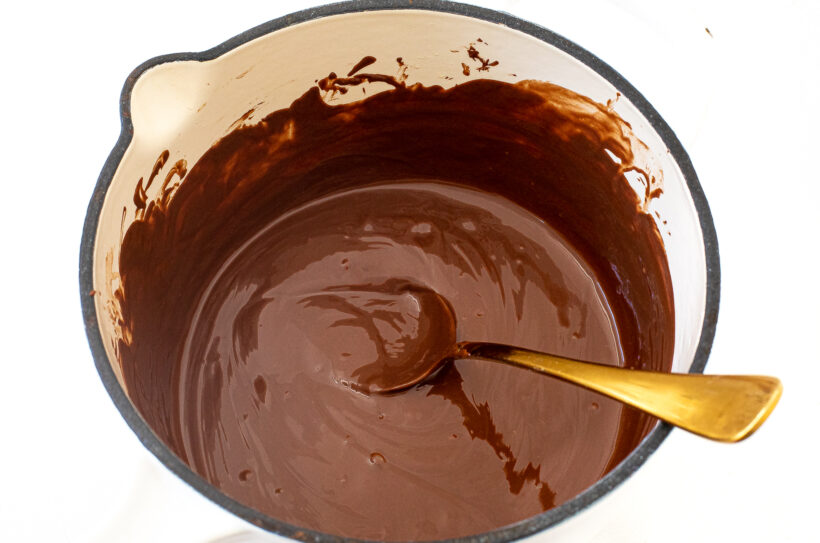 Melted chocolate in a saucepan.