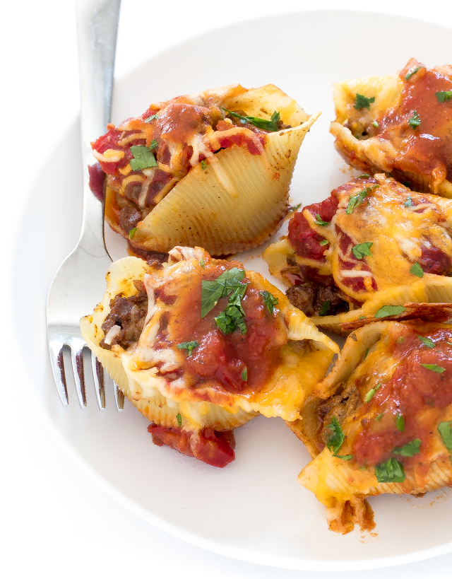 Mexican Stuffed Shells on white plate with fork