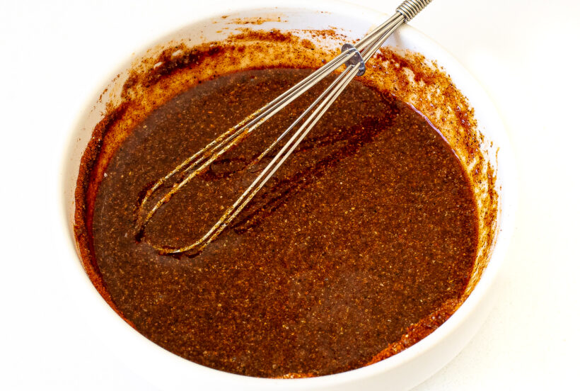 mixing spice paste for pork shoulder