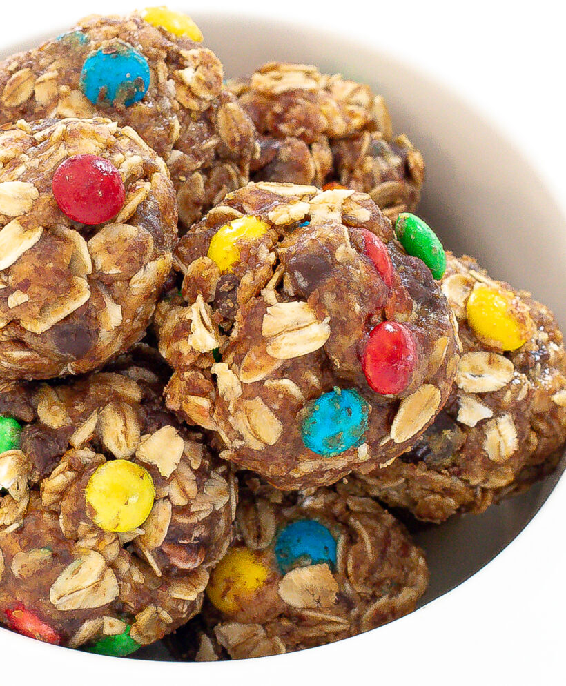 Up close shot of monster energy balls in a white bowl.