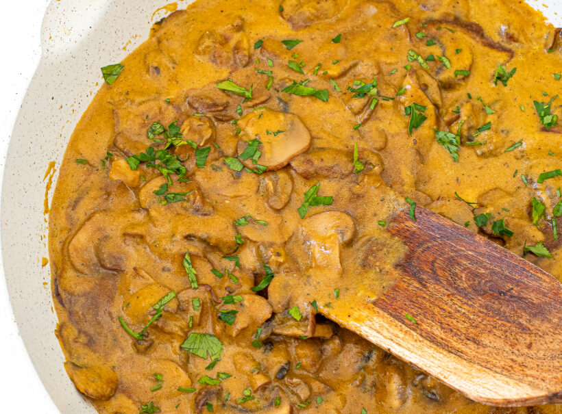 Mushroom gravy in a skillet.