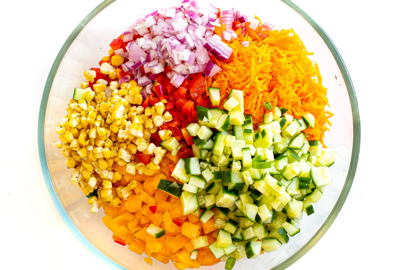 Salad ingredients in a mixing bowl.