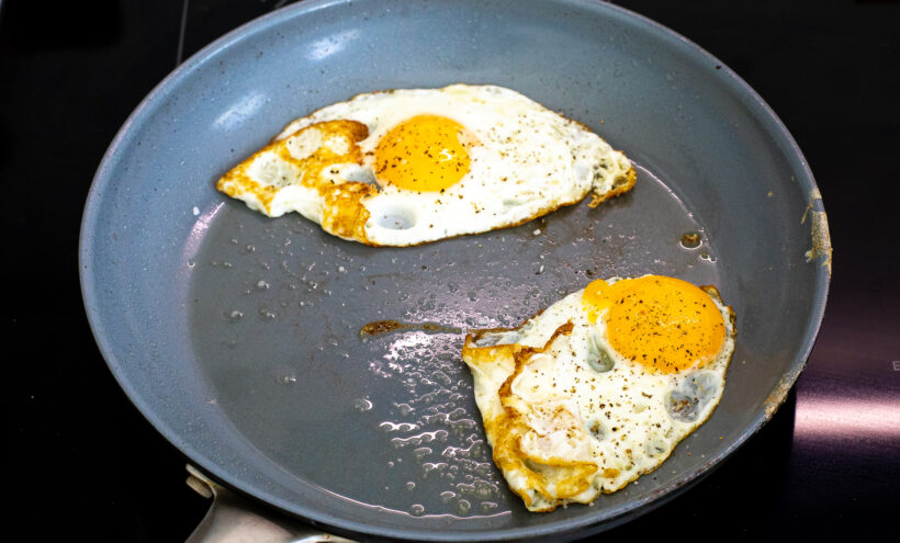 Eggs frying in a pan. 