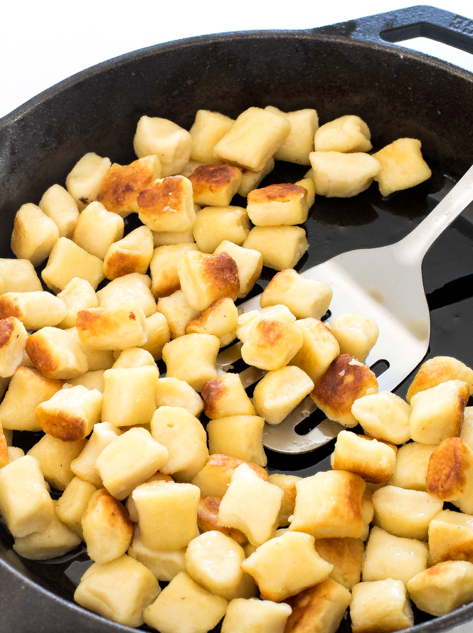 Browning Potato Gnocchi in cast iron skillet