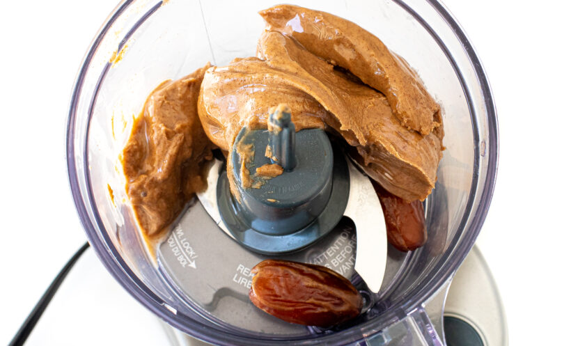 Dates and peanut butter in a food processor.