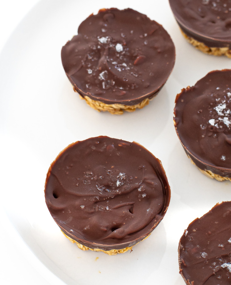 Peanut butter chocolate oat cups on a white serving platter.
