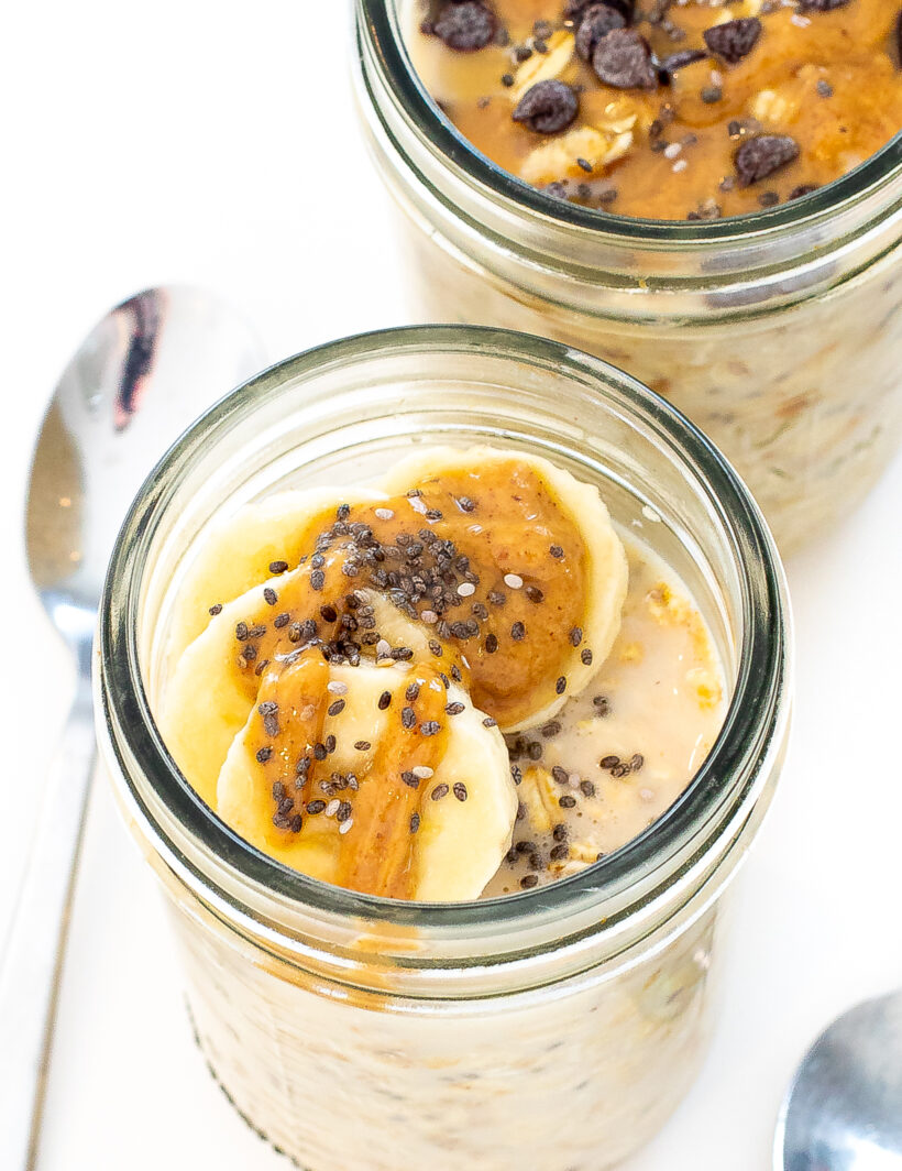 Peanut butter overnight oats in a glass jar.
