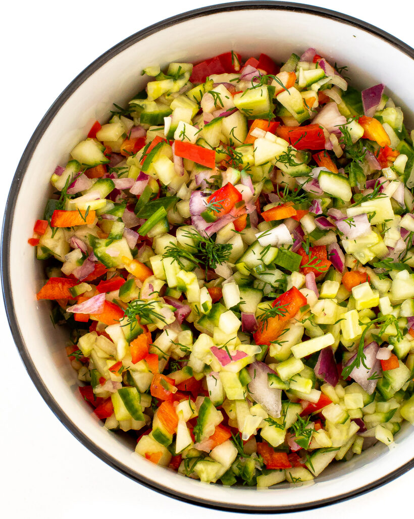 Pickle de Gallo in a black rimmed white serving bowl.